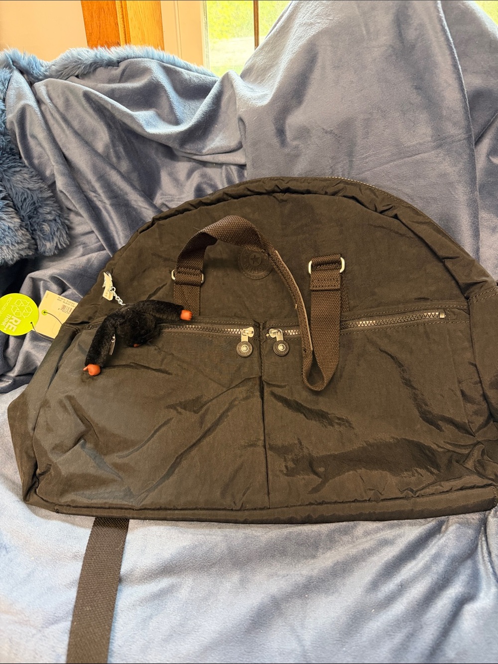 Kipling Black Duffel Bag with Plush Monkey Charm